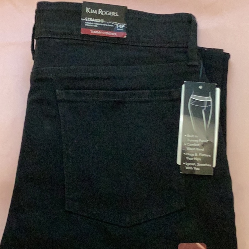 Ladies black denim never worn with tags.